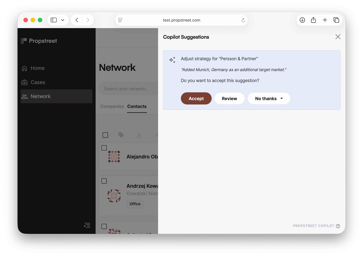 The AI suggestions panel showing pending suggestions with company names, descriptions and Accept, Review and Dismiss buttons.